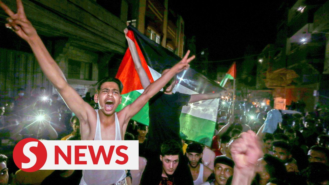 Locals in Gaza celebrate ceasefire between Israel, Hamas on streets ...