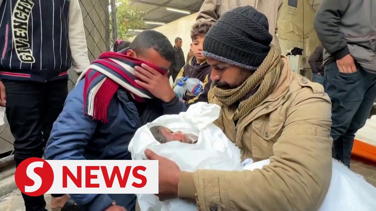Palestinians hold funeral for 12 members of two families killed in ...